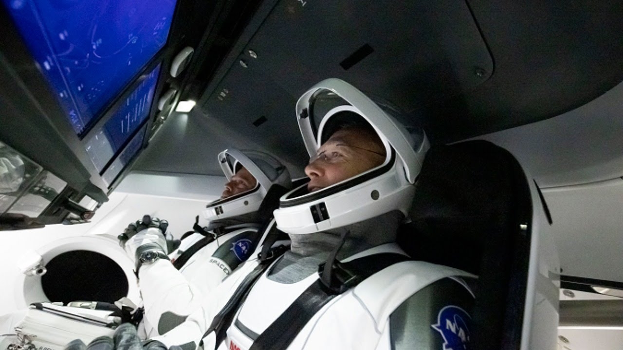 Nasa astronauts head home on SpaceX Dragon as storm eases (Video)